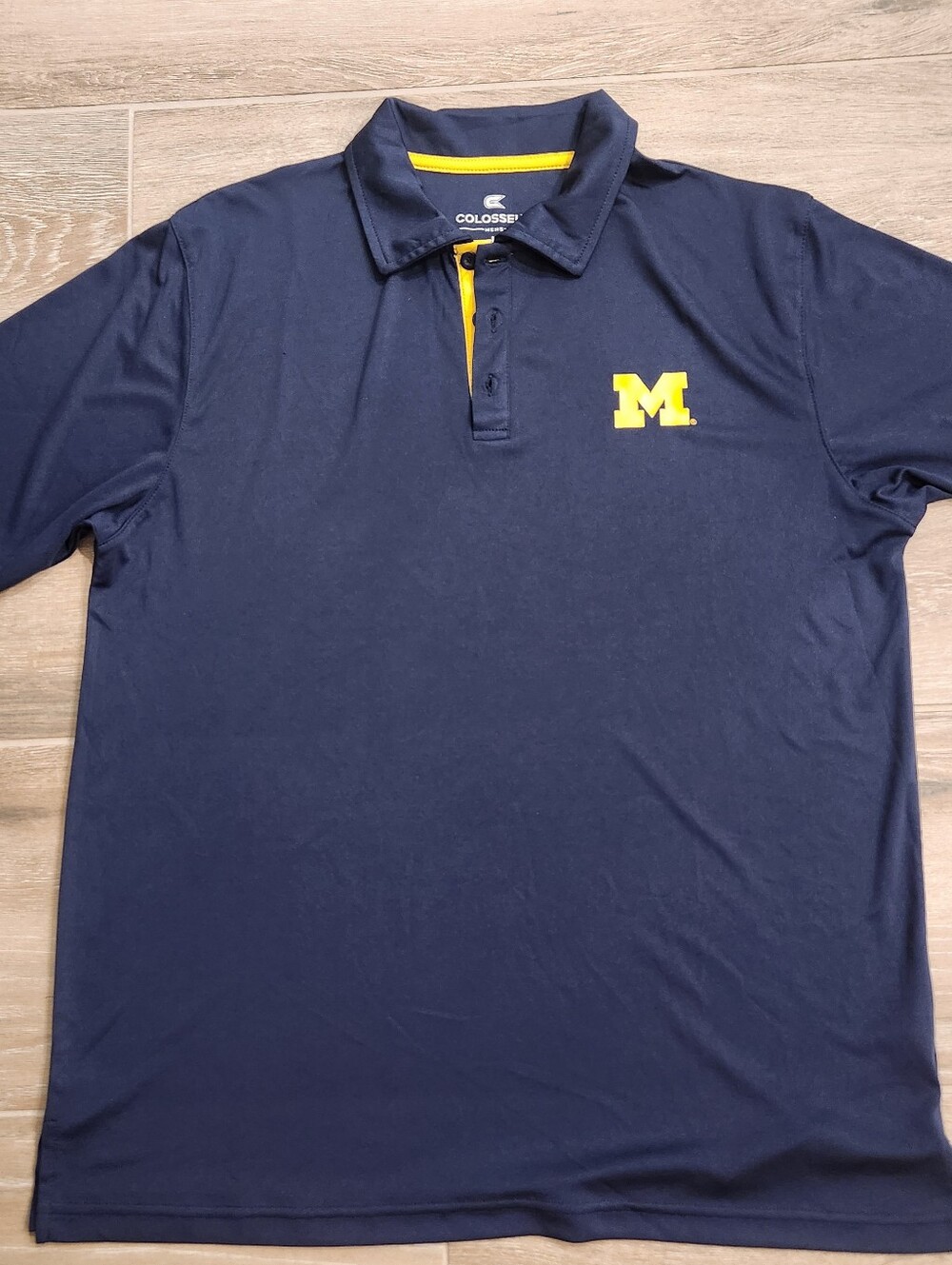 Colosseum Navy Polo Shirt with Yellow 'M' Logo- Michigan